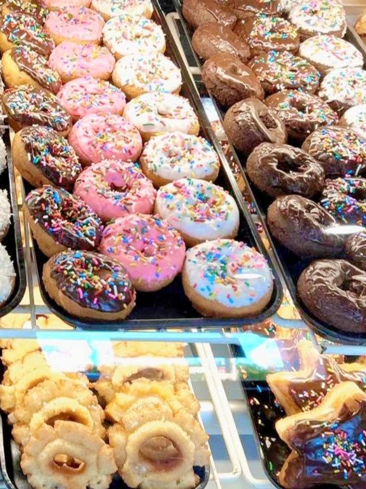 display of dozens of donuts